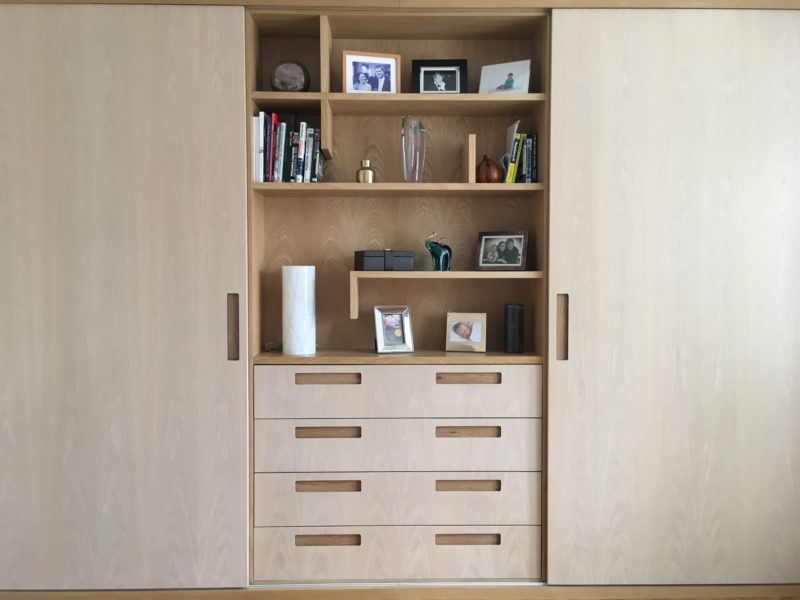 Storage Unit with open shelving, drawers and full height cupboards. Natural toned shelving unit. Timber open shelving.