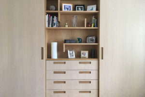 Storage Unit with open shelving, drawers and full height cupboards. Natural toned shelving unit. Timber open shelving.