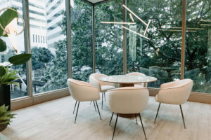 Collaborative Area with reupholstered armchairs and Theo dining table from Castlery.